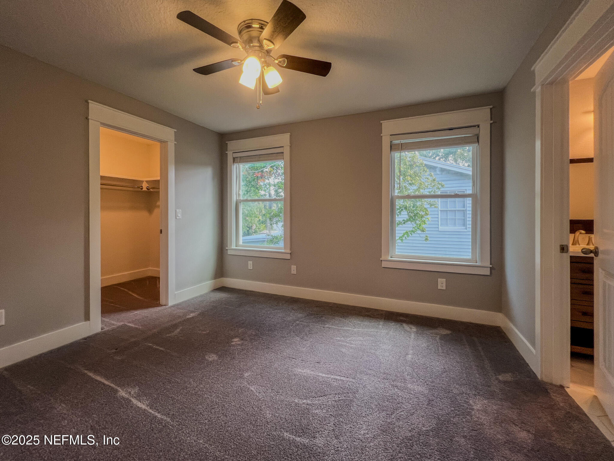 4325 Appleton Avenue Jacksonville, FL 32210 - Photo 31 of 40 an empty room with windows and fan
