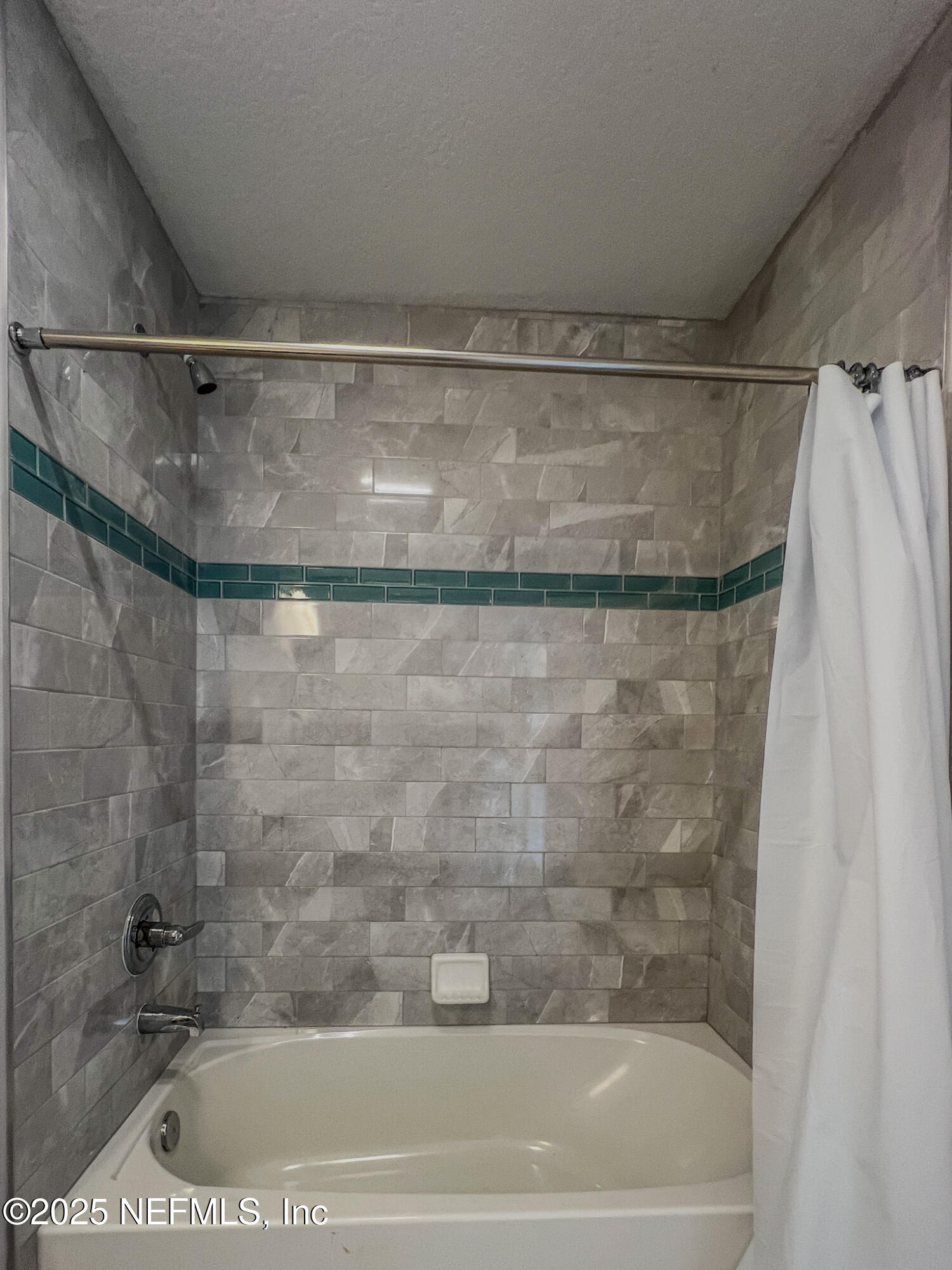 4325 Appleton Avenue Jacksonville, FL 32210 - Photo 33 of 40 a close view of a bathtub in a bathroom