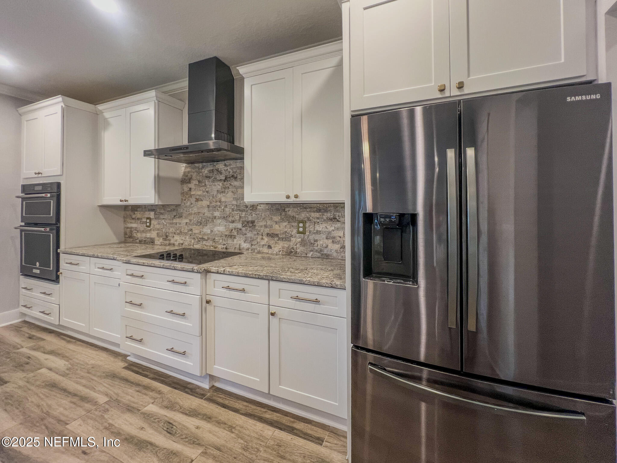 4325 Appleton Avenue Jacksonville, FL 32210 - Photo 9 of 40 a kitchen with stainless steel appliances a refrigerator and cabinets