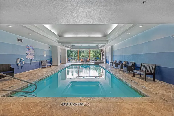 a view of a patio with chair and table