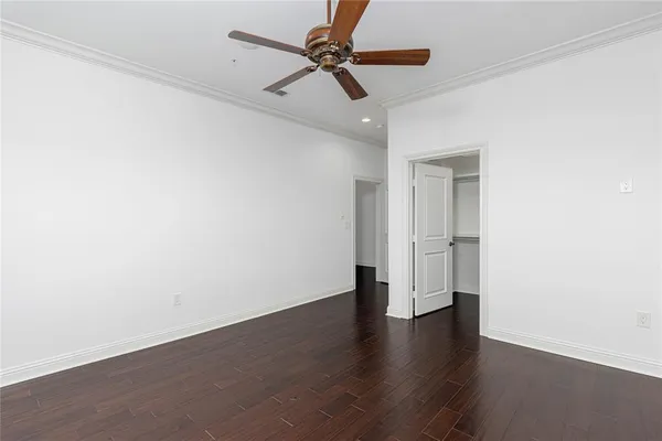 a utility room with cabinets washer and dryer