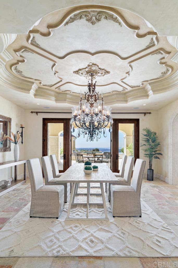 18441 Via Ambiente Rancho Santa Fe, CA 92067 - Photo 14 of 35 a living room with furniture and a chandelier