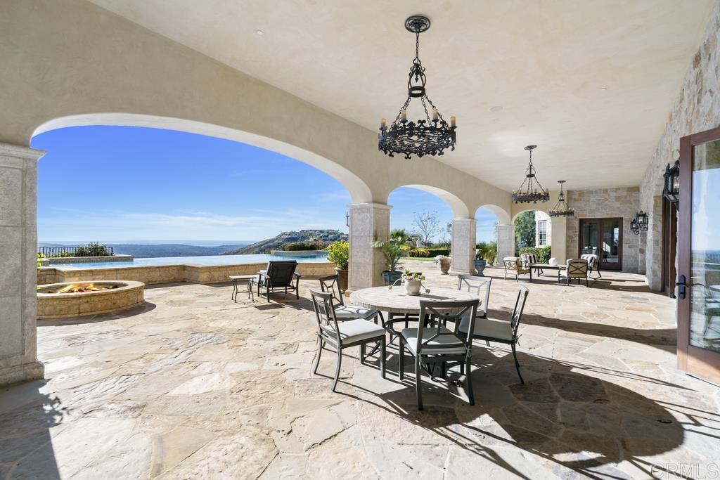 18441 Via Ambiente Rancho Santa Fe, CA 92067 - Photo 18 of 35 a view of a dining room and livingroom