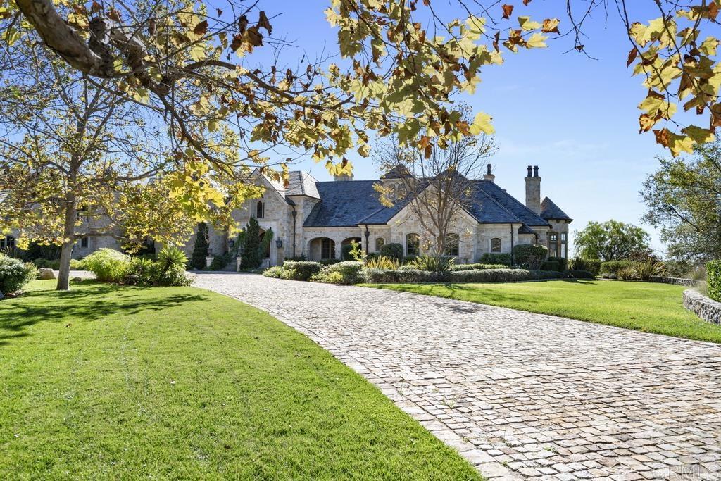 18441 Via Ambiente Rancho Santa Fe, CA 92067 - Photo 2 of 35 a front view of house with yard and green space