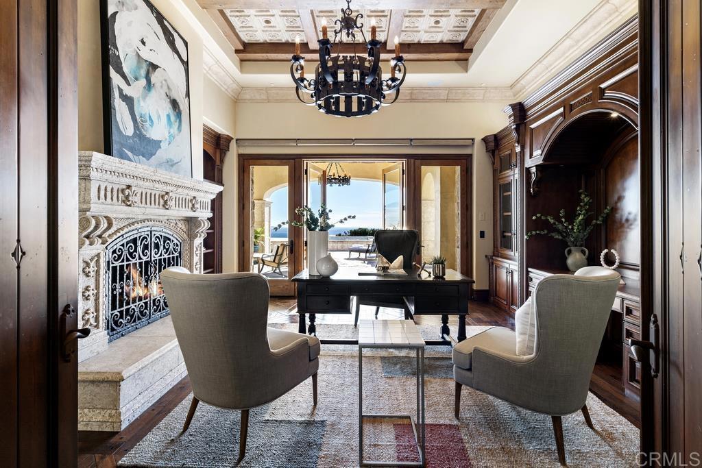 18441 Via Ambiente Rancho Santa Fe, CA 92067 - Photo 31 of 35 a dining room with furniture a chandelier and a rug