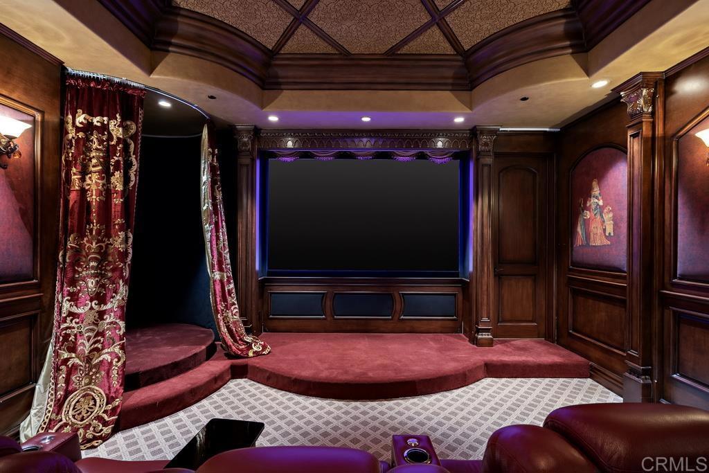 18441 Via Ambiente Rancho Santa Fe, CA 92067 - Photo 32 of 35 a living room with furniture and a flat screen tv