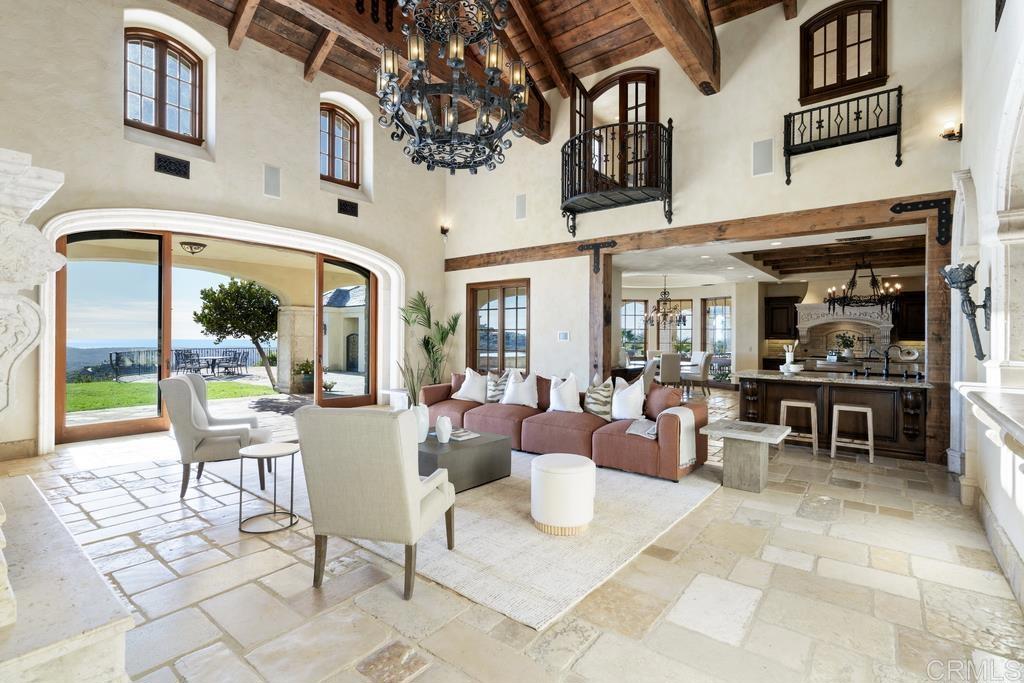 18441 Via Ambiente Rancho Santa Fe, CA 92067 - Photo 6 of 35 a view of a patio with dining table and chairs