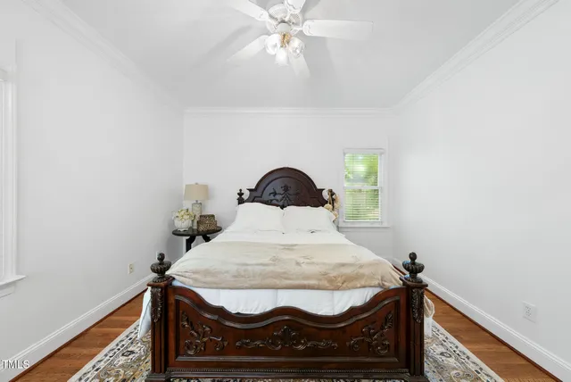 a spacious bathroom with a granite countertop sink mirror toilet and bathtub