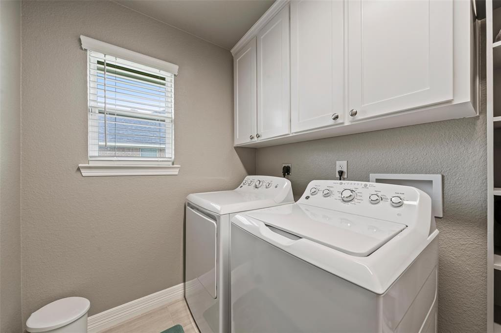 828 Agile Street Hewitt, TX 76643 - Photo 21 of 30 a utility room with dryer and washer