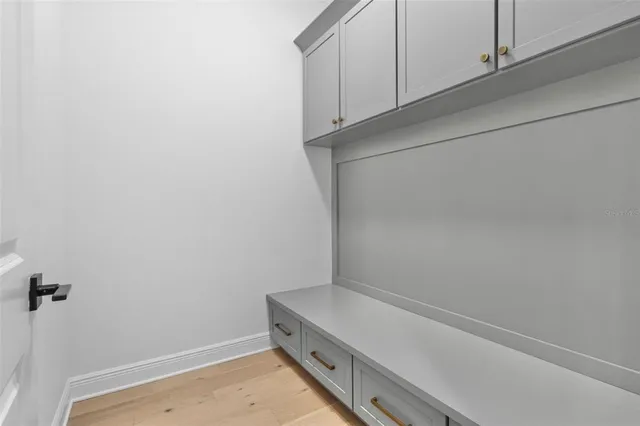 a view of a room with racks on the wall