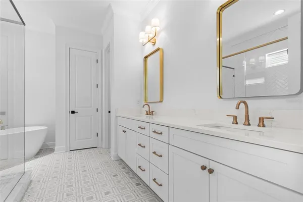 a white bath tub sitting in a bathroom