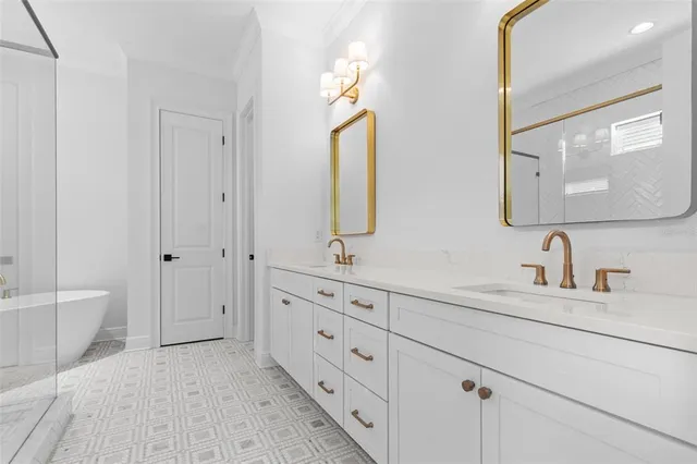 a white bath tub sitting in a bathroom