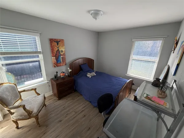 a kitchen with stainless steel appliances granite countertop wooden cabinets a refrigerator a stove a sink and dishwasher