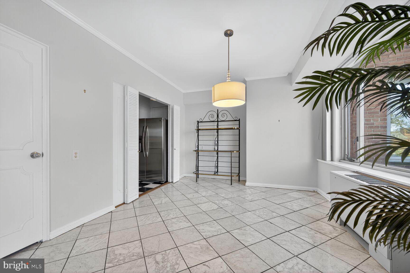 4301 Massachusetts Avenue Northwest, Unit 6014 Washington, DC 20016 - Photo 13 of 22 a view of a room and window