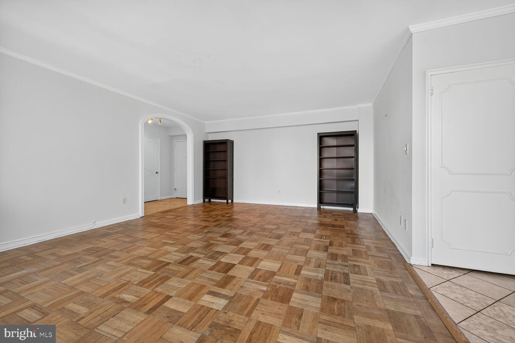 4301 Massachusetts Avenue Northwest, Unit 6014 Washington, DC 20016 - Photo 14 of 22 a view of an empty room and window