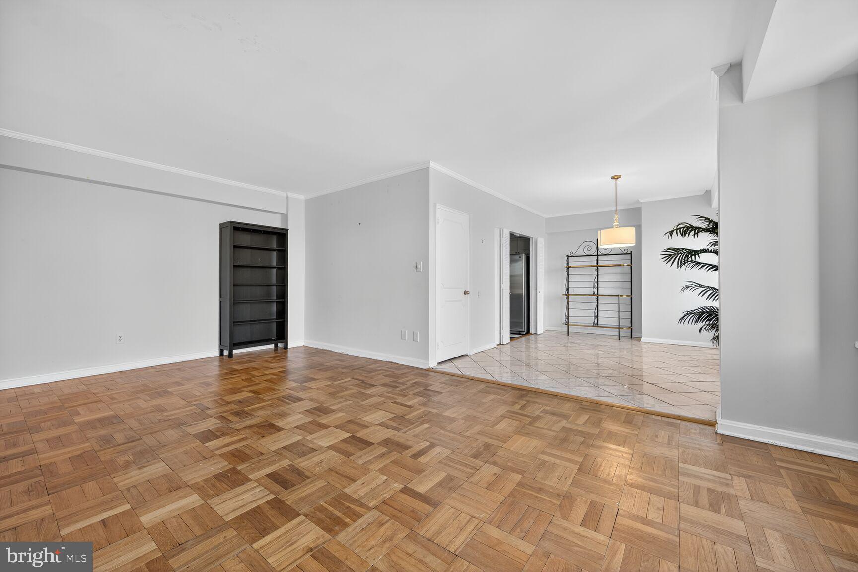 4301 Massachusetts Avenue Northwest, Unit 6014 Washington, DC 20016 - Photo 15 of 22 a view of an empty room with closet and a window