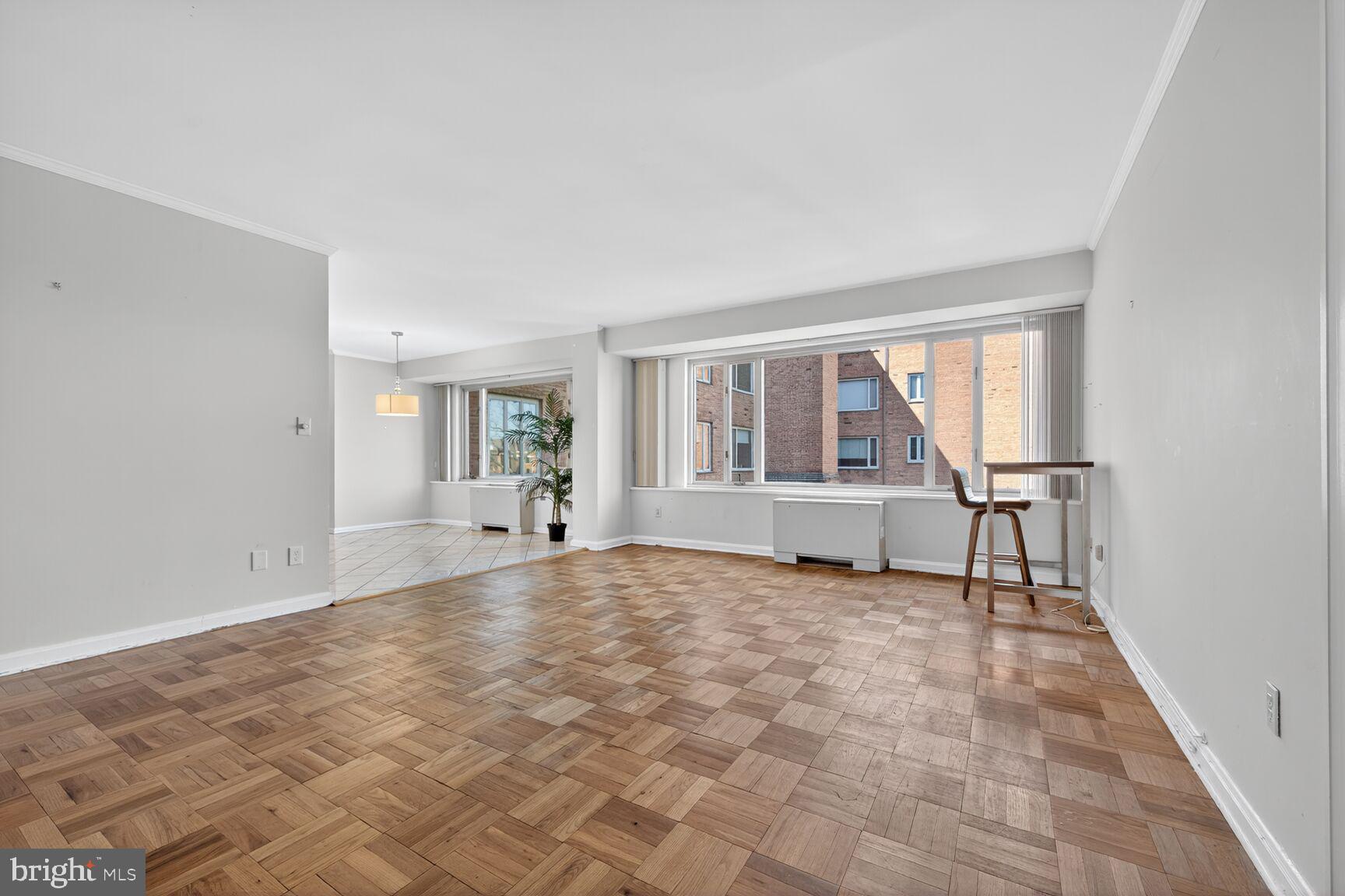 4301 Massachusetts Avenue Northwest, Unit 6014 Washington, DC 20016 - Photo 16 of 22 a view of an empty room with a window