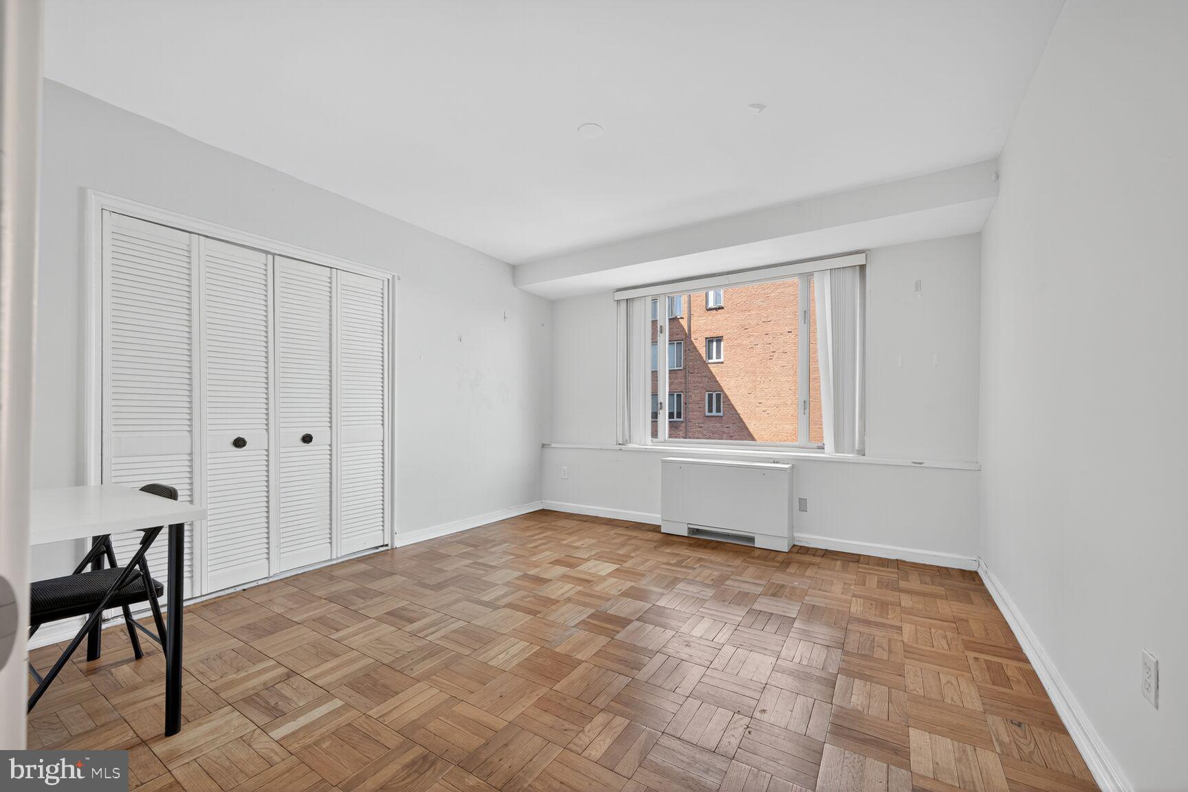 4301 Massachusetts Avenue Northwest, Unit 6014 Washington, DC 20016 - Photo 10 of 22 a view of an empty room with a window