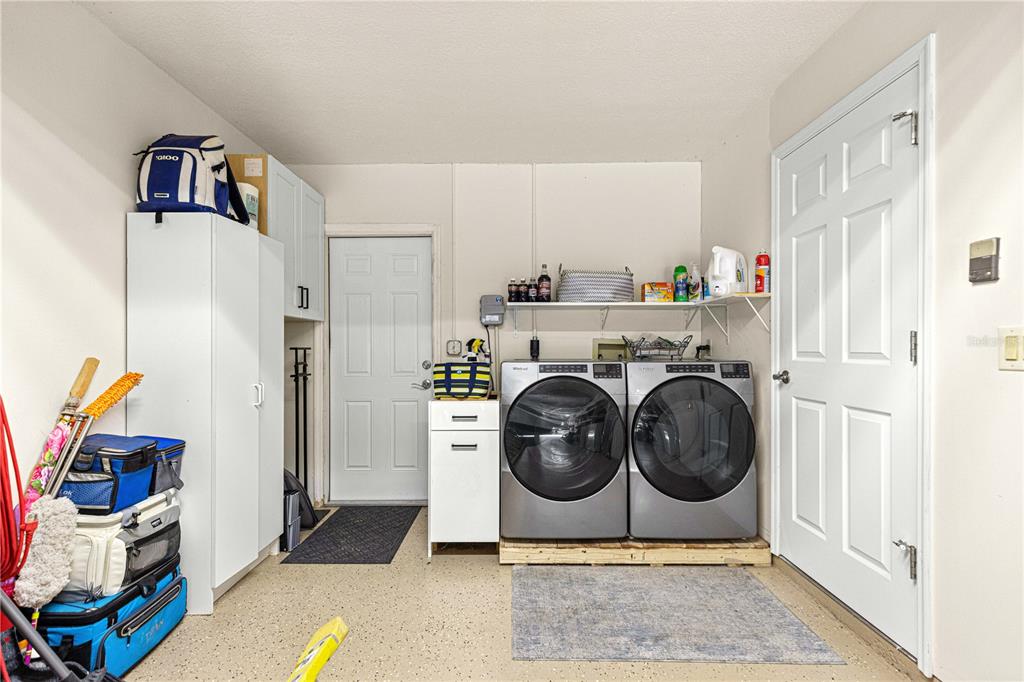 1155 East Bismark Street Hernando, FL 34442 - Photo 34 of 52 a utility room with sink dryer and washer
