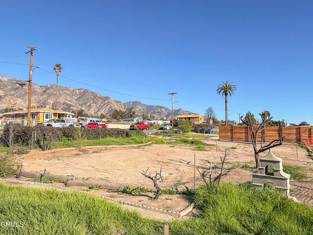 a view of a yard with an outdoor space
