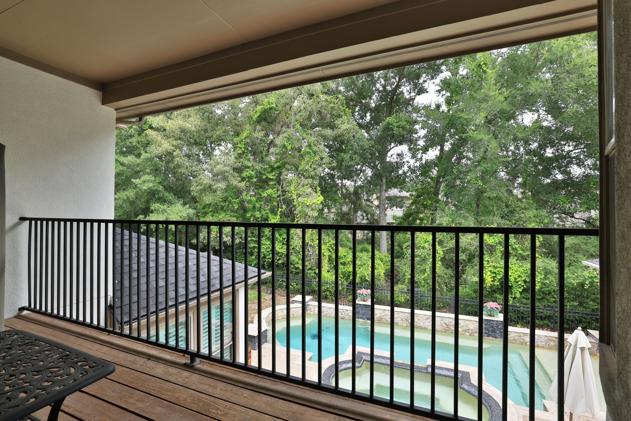 1214 Eversham Way Kingwood, TX 77339 - Photo 40 of 50 Balcony overlooking the back yard. A great place to relax looking over the pool.