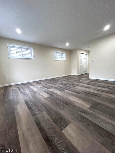 22 Cross Street Union, NJ 07088 - Photo 5 of 14 a view of an empty room with wooden floor and a window