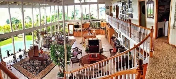 a outdoor living space with furniture and a fireplace