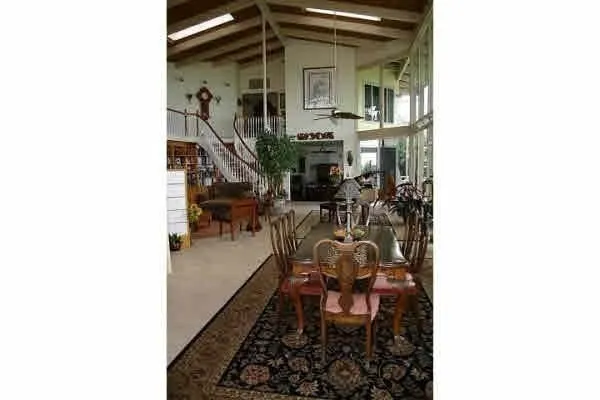 a black and white living room with furniture