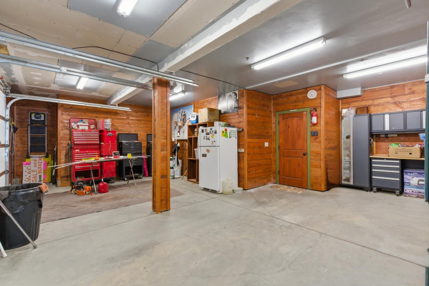 12767 Newtown Road Nevada City, CA 95959 - Photo 23 of 57 a view of a garage with furniture