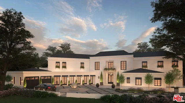 a front view of a residential houses with yard