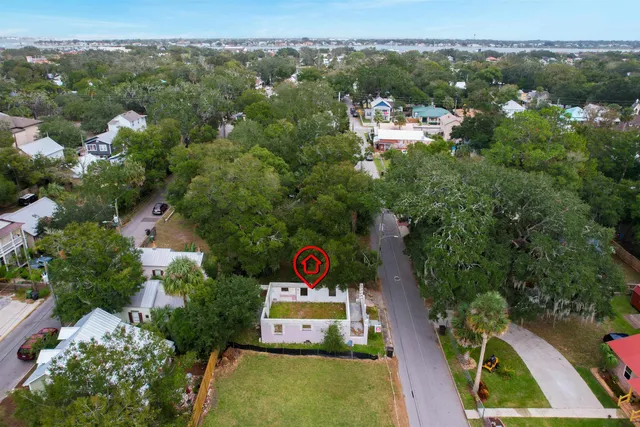 an aerial view of a town with swimming pool