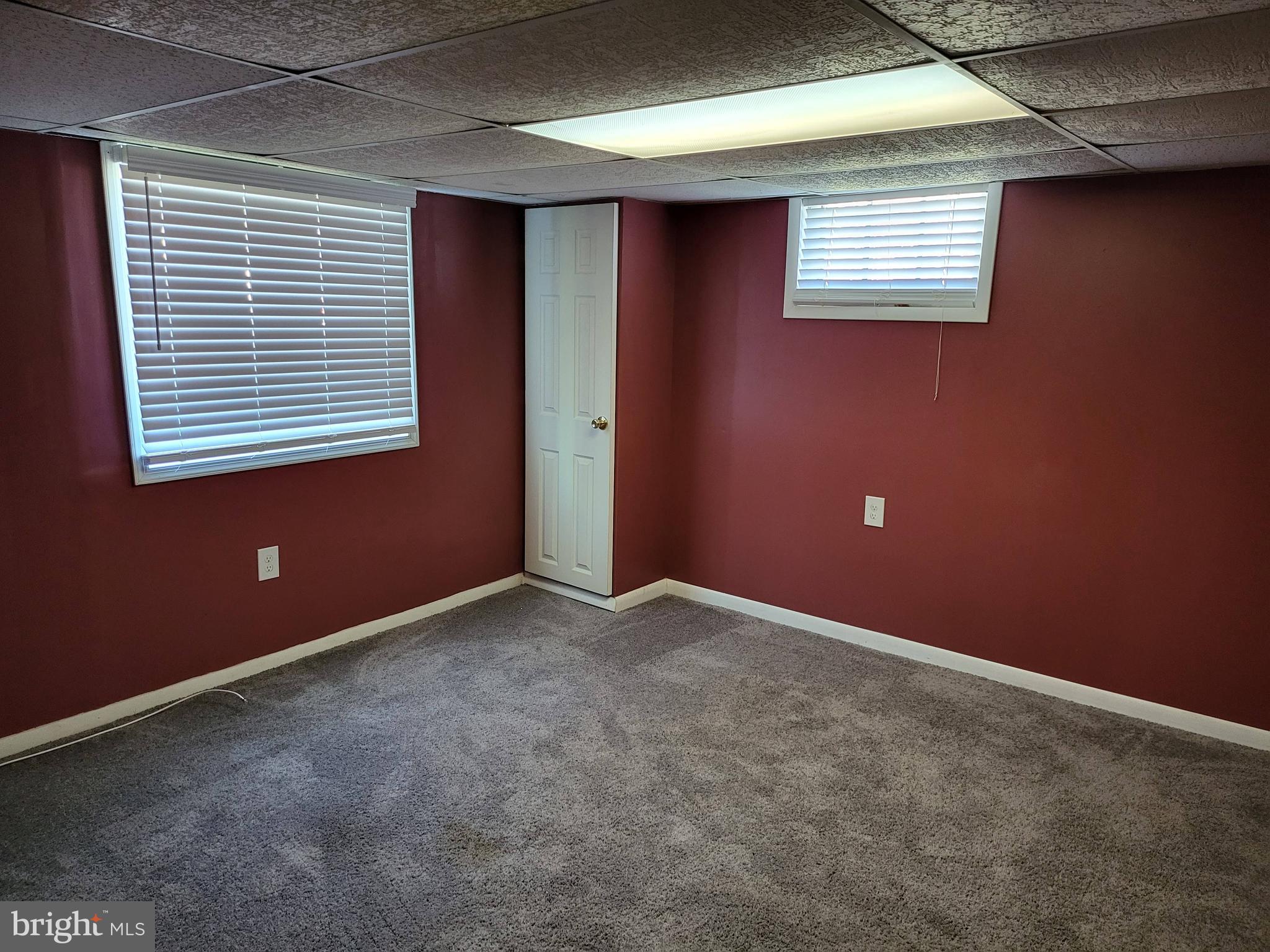 8600 Dovedale Road Randallstown, MD 21133 - Photo 17 of 20 Basement family room with window exit