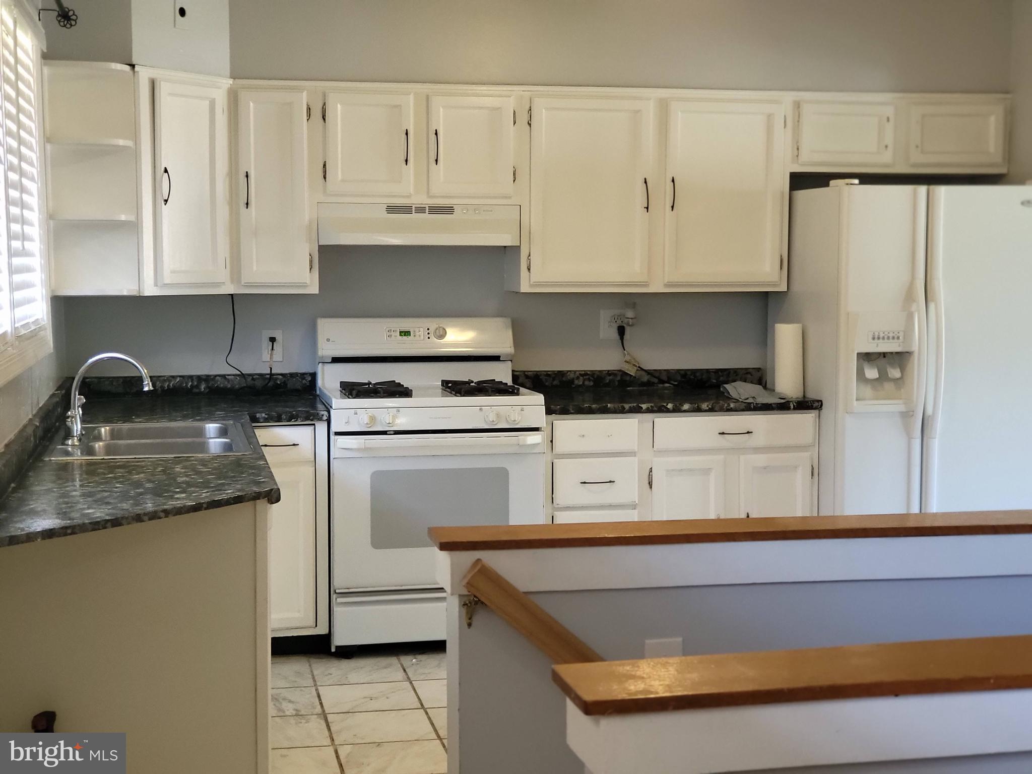 8600 Dovedale Road Randallstown, MD 21133 - Photo 8 of 20 Looking at kitchen from dining room
