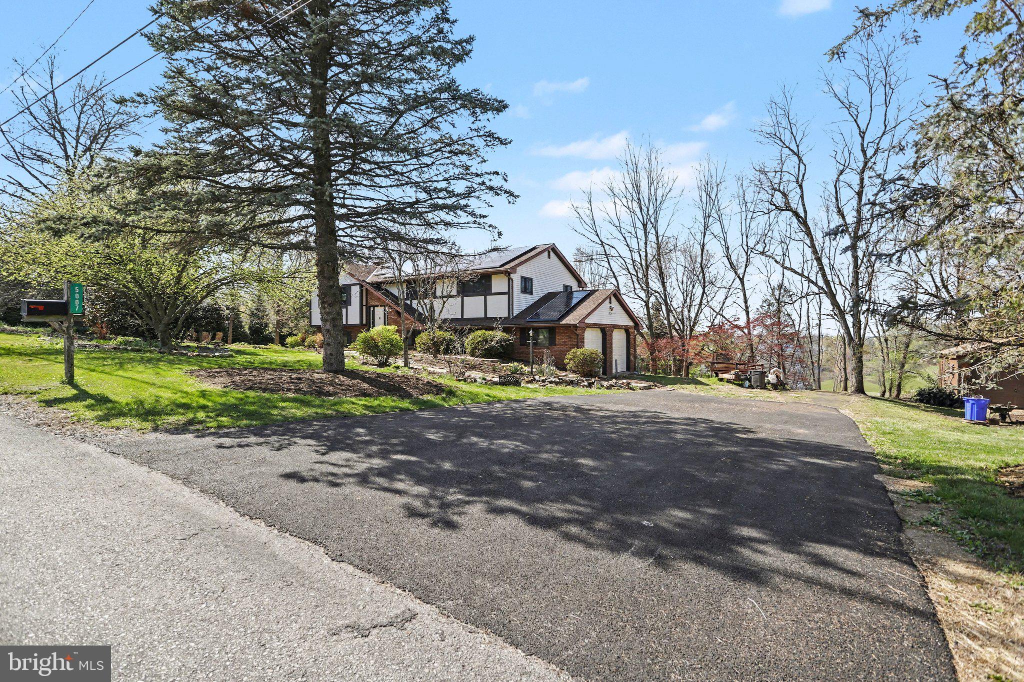 5007 Snyder Mill Road Spring Grove, PA 17362 - Photo 2 of 33 a view of road with large trees