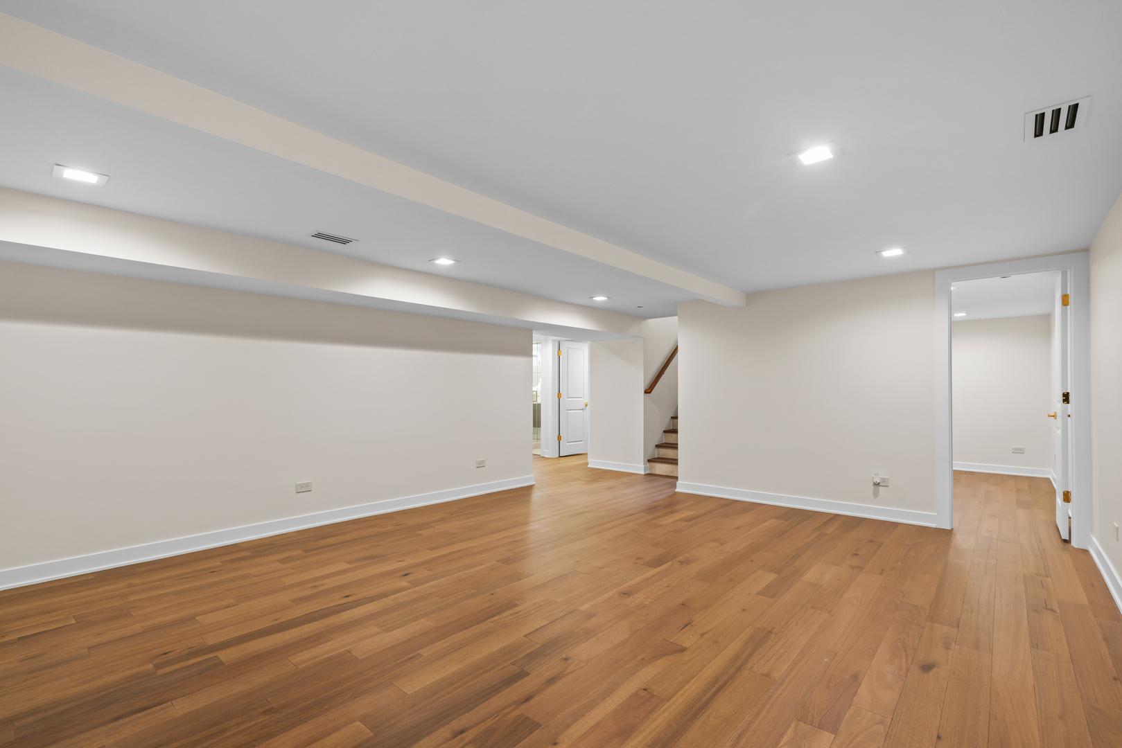 830 Deerfield Road Highland Park, IL 60035 - Photo 13 of 40 a view of an empty room with wooden floor