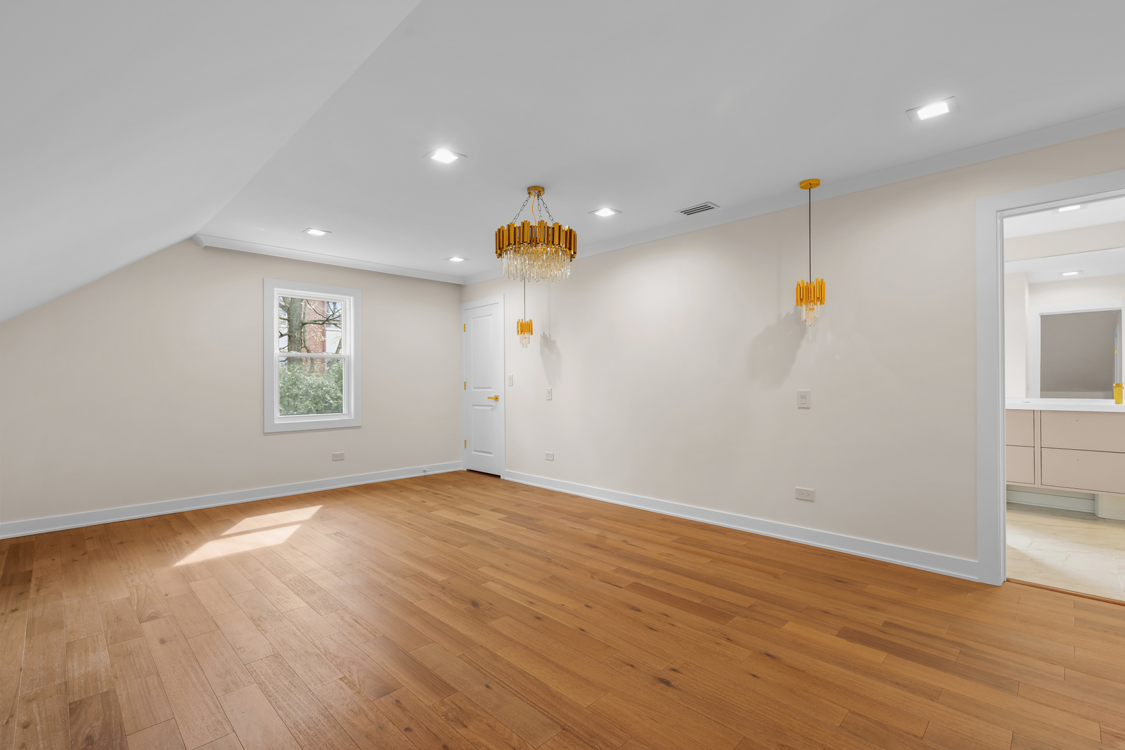 830 Deerfield Road Highland Park, IL 60035 - Photo 20 of 40 an empty room with wooden floor and windows