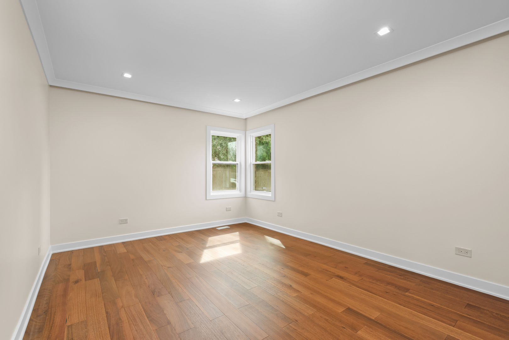 830 Deerfield Road Highland Park, IL 60035 - Photo 28 of 40 a view of empty room with wooden floor and fan