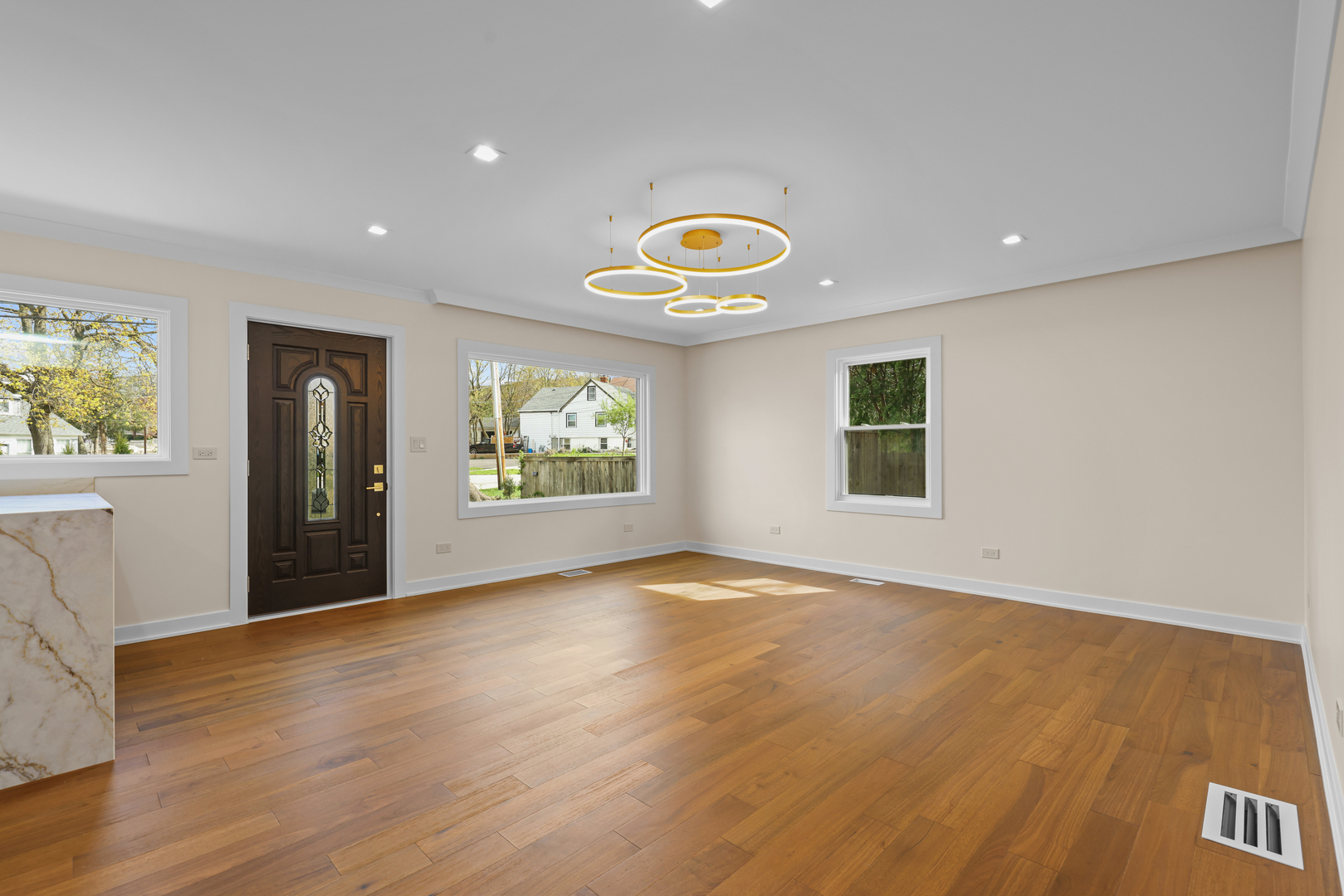 830 Deerfield Road Highland Park, IL 60035 - Photo 33 of 40 a view of a livingroom with wooden floor and window