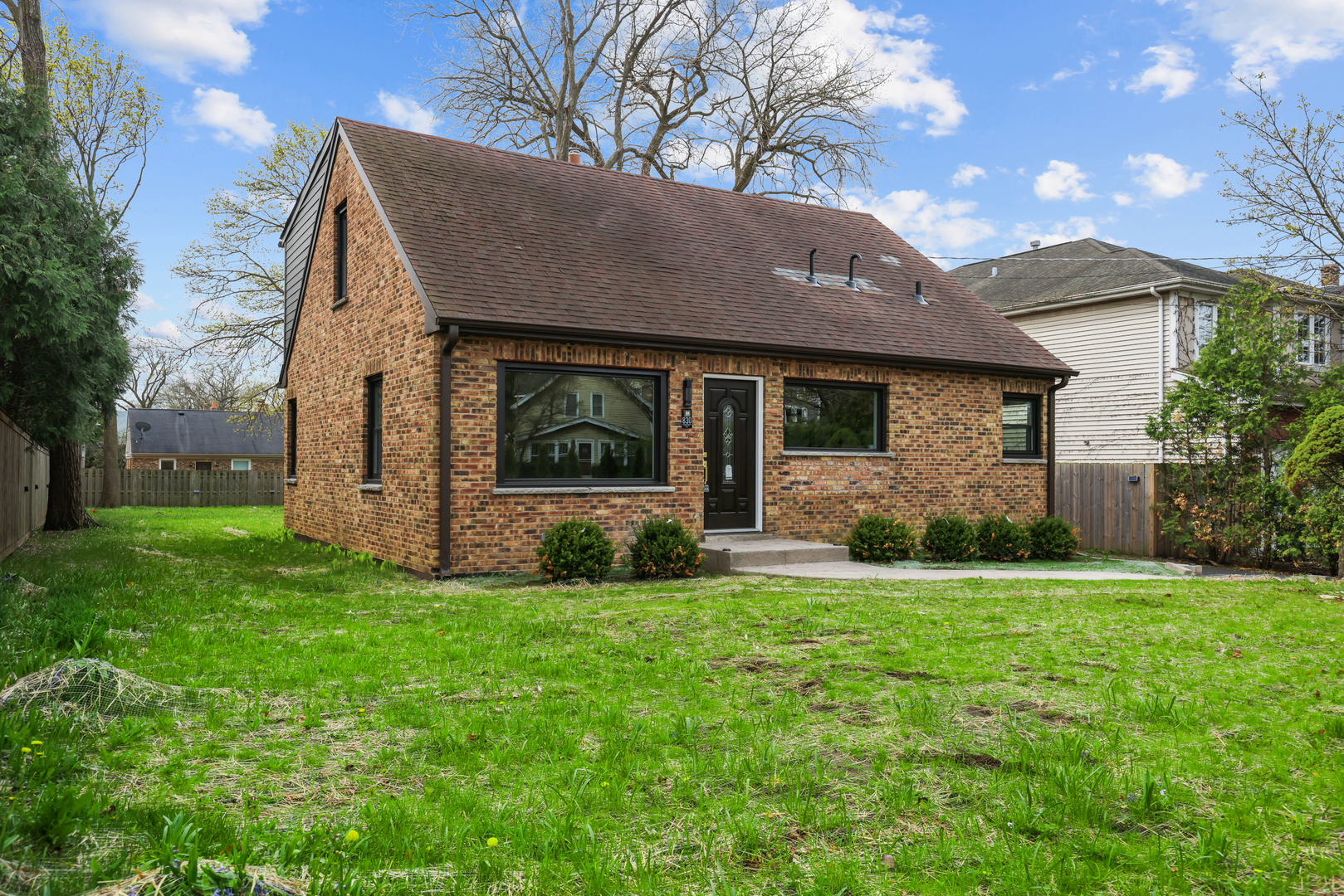 830 Deerfield Road Highland Park, IL 60035 - Photo 4 of 40 a view of a house with a yard