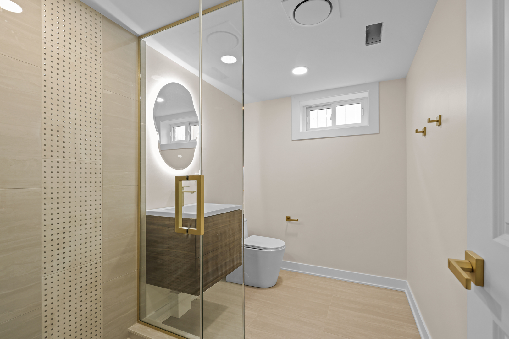 830 Deerfield Road Highland Park, IL 60035 - Photo 8 of 40 a bathroom with a toilet mirror and vanity