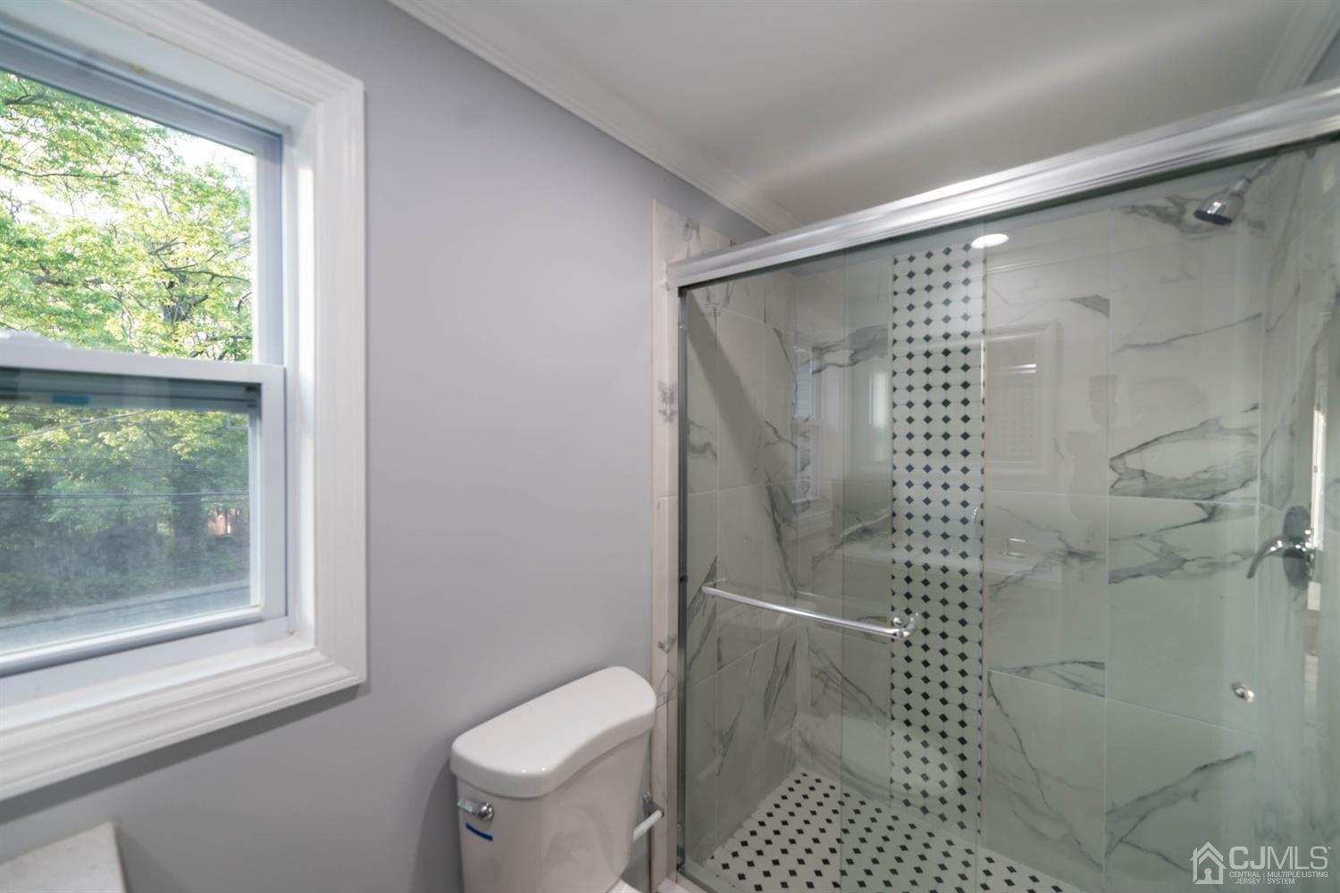 429 Chain O' Hills Road Colonia, NJ 07067 - Photo 36 of 44 a bathroom with a shower and toilet
