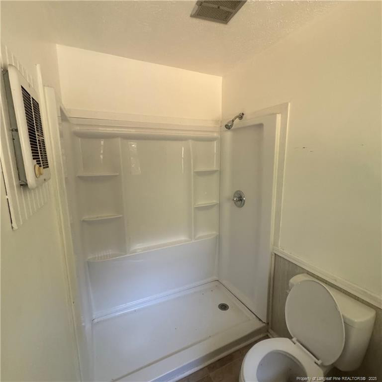 415 Brockington Road Fairmont, NC 28340 - Photo 16 of 22 a bathroom with a shower and toilet