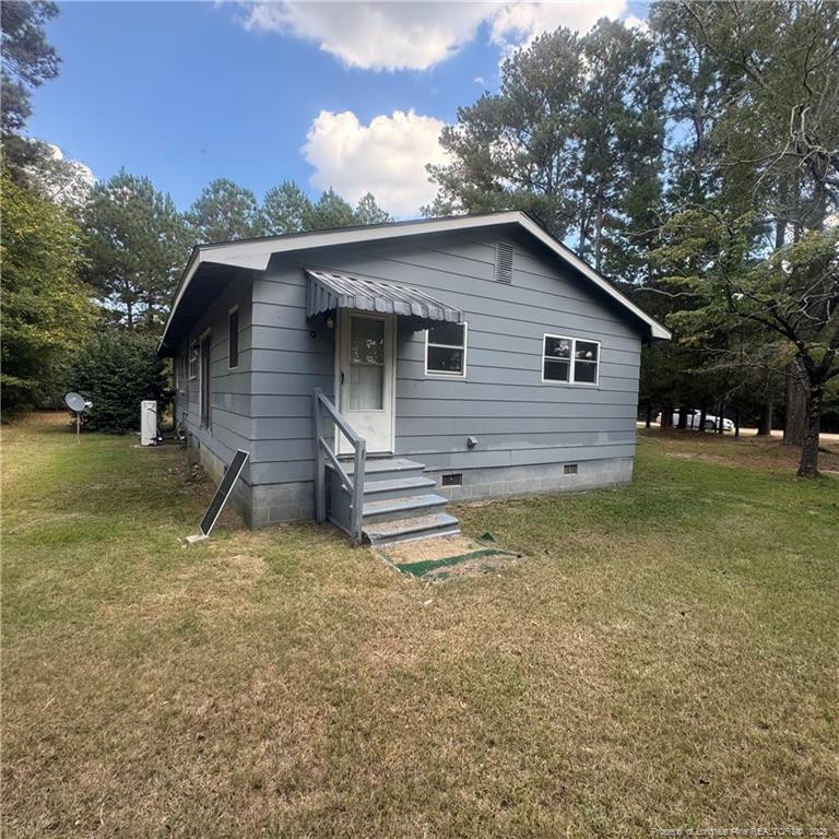 415 Brockington Road Fairmont, NC 28340 - Photo 20 of 22 a view of a house with a yard