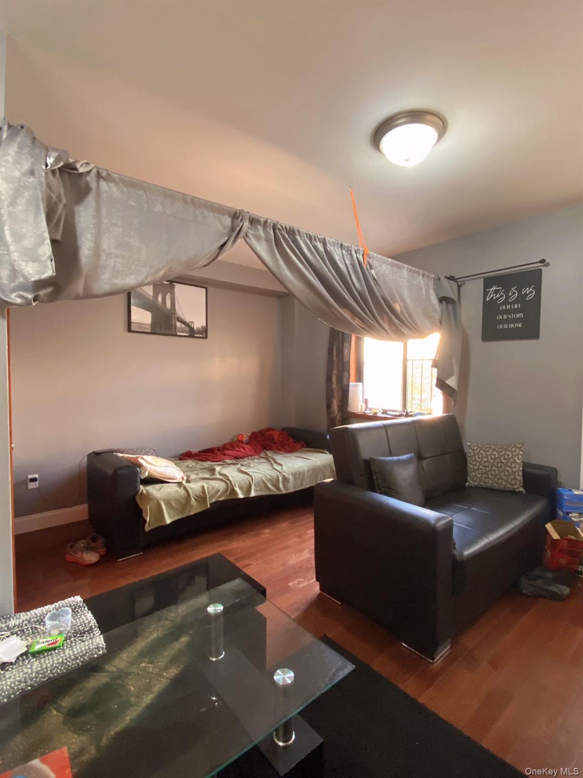 90-19 Corona Avenue Queens, NY 11373 - Photo 16 of 23 a living room with furniture and a couch