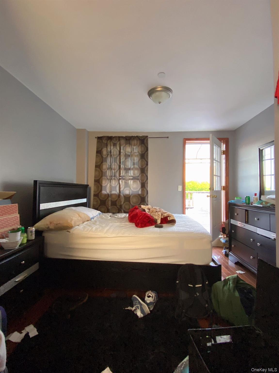 90-19 Corona Avenue Queens, NY 11373 - Photo 17 of 23 a bedroom with a bed and window