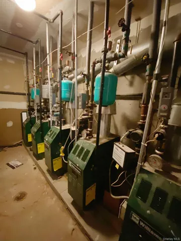 a bathroom with a toilet a sink and shower
