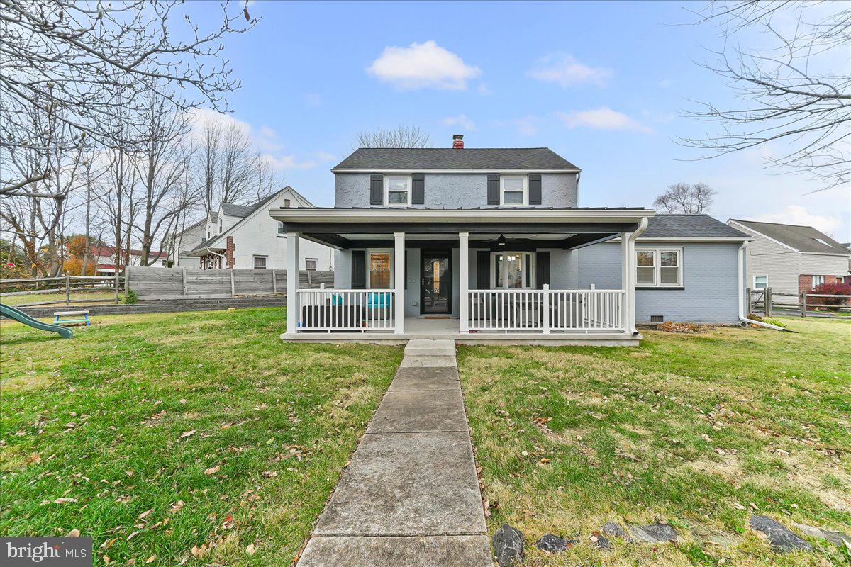 a view of a house with a garden