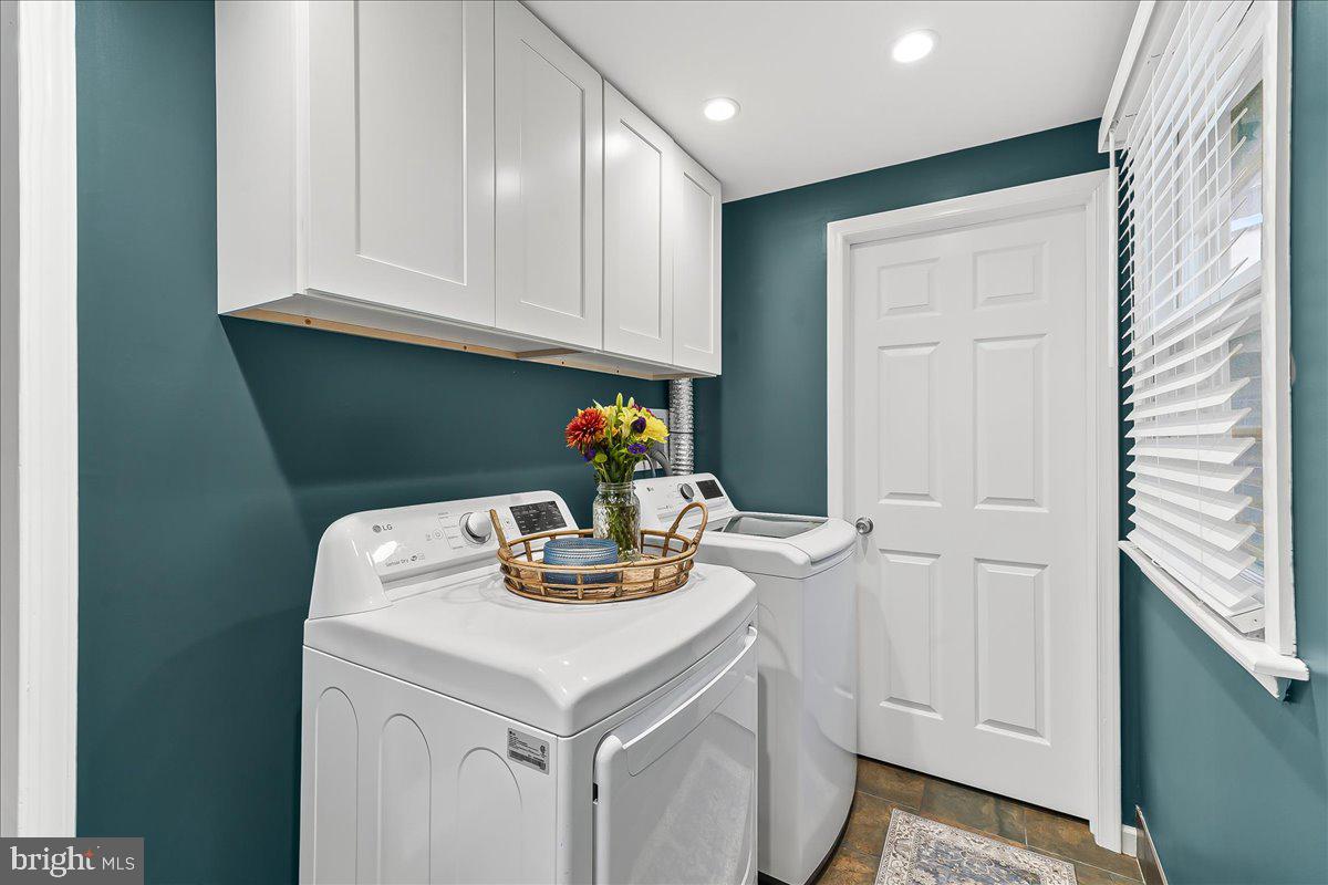 2330 Poe Road Secane, PA 19018 - Photo 19 of 33 a kitchen with a sink cabinets and stove