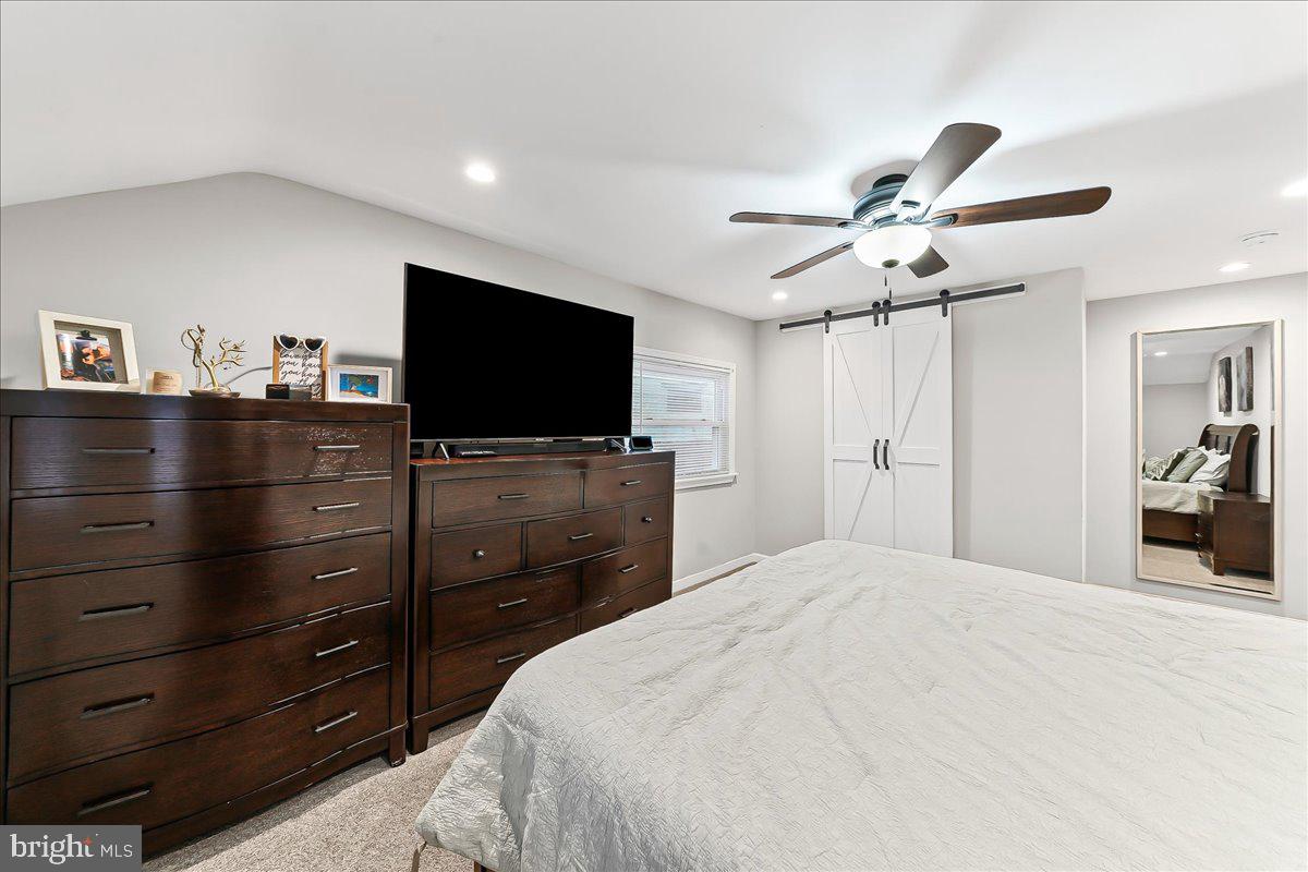 2330 Poe Road Secane, PA 19018 - Photo 21 of 33 a bedroom with a bed and a flat screen tv