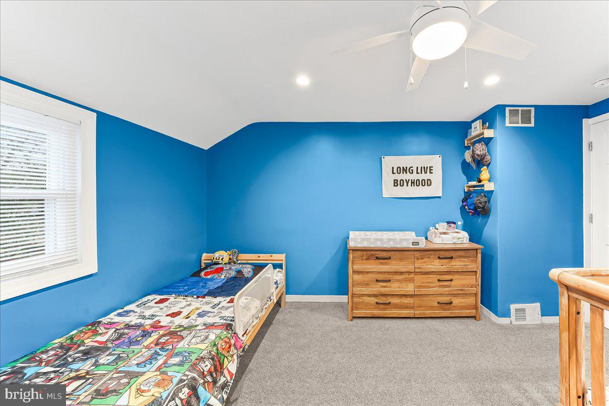 2330 Poe Road Secane, PA 19018 - Photo 25 of 33 a bedroom with a bed and a dresser